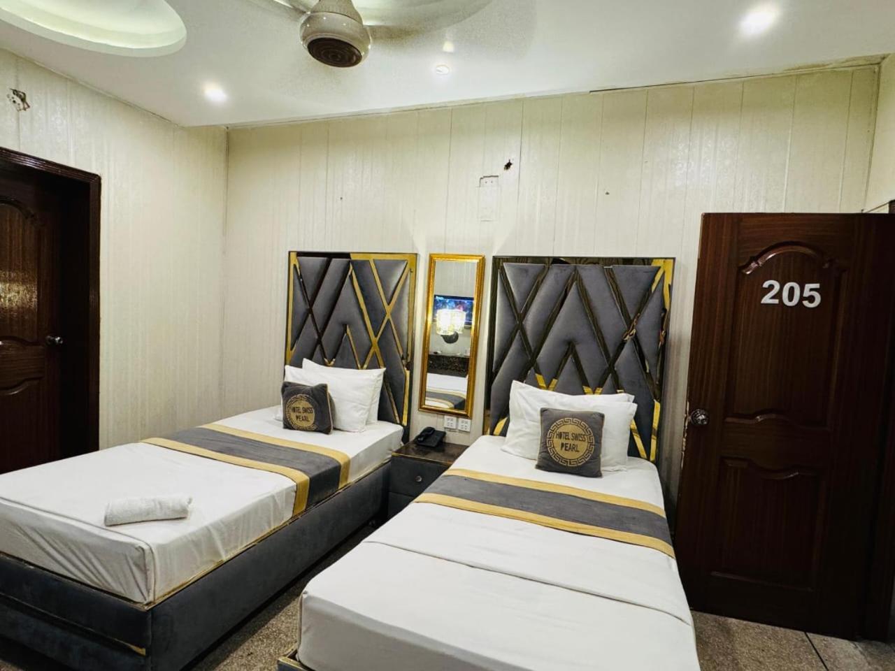 Hotel Swiss Pearl Lahor Oda fotoğraf